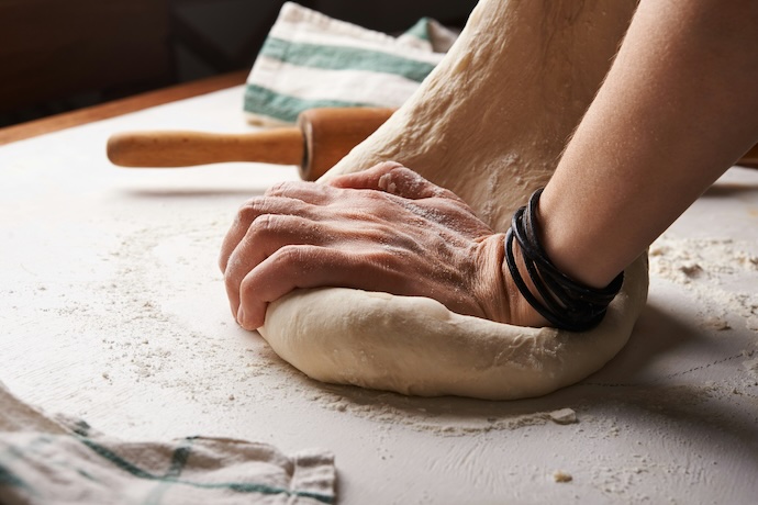 rolling pizza dough