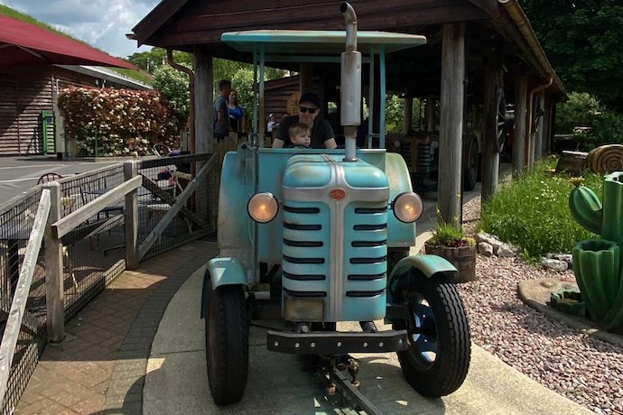 dad and son in tractor