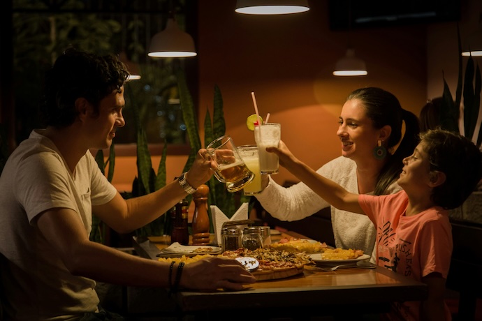 family celebrate national pizza day