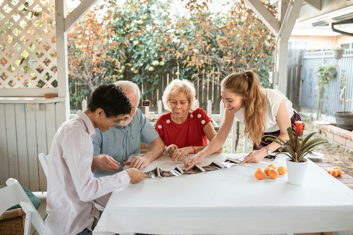 family at table with photos