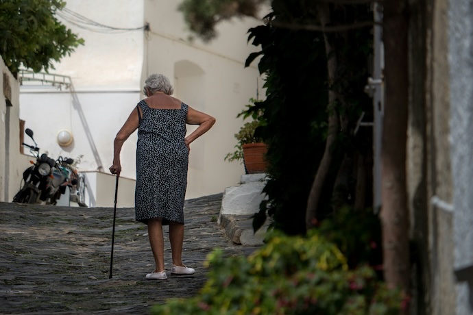 old lady with walking stick