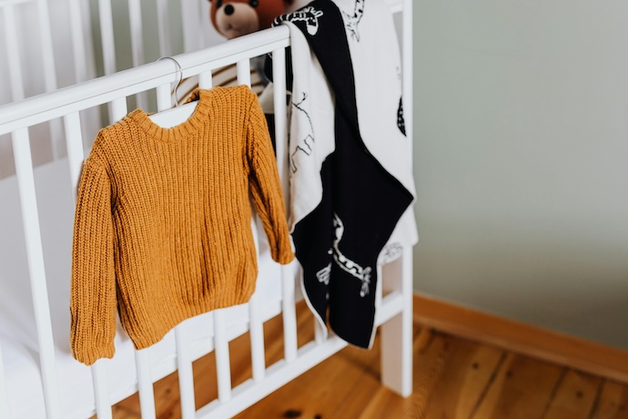 clothes on crib