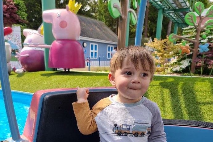 Young boy on Peppa Pig Ride