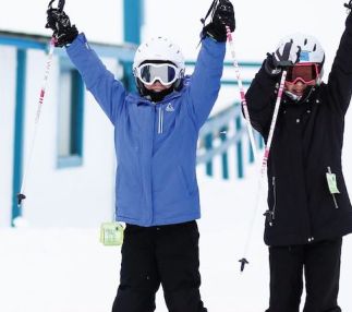 powder ridge two skiing girls